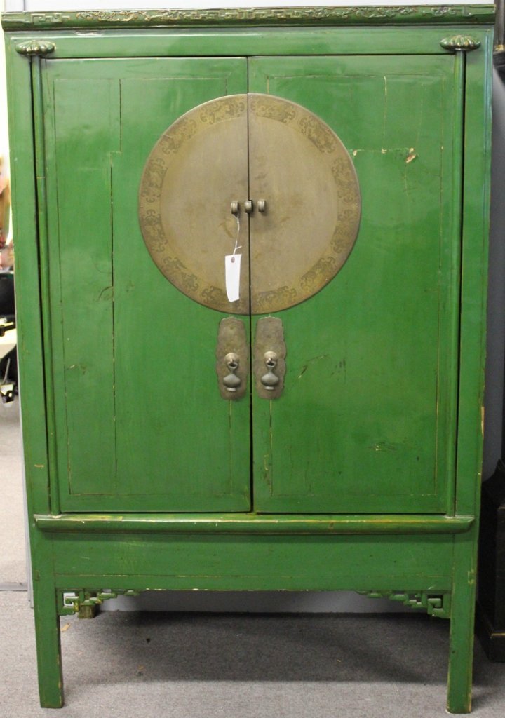 Antique / Vintage Asian 2 Door Cabinet.: In original green lacquer finish. Interior drawer and lift top compartment. With nicely engraved brass hardware. From a New Rochelle, NY home. Dimensions: 43.75" w x 21.75" d x 68.75" h.