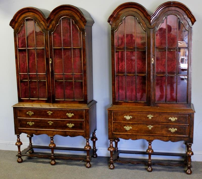 Pair Antique Arch Top Spanish Style Bookcases.: Raised on stands. Nice and rare to find a matching pair. 2 doors over 2 drawers with individual glass panes . From a Park Ave, NYC estate. Dimensions: 78" h x 39" w x 16" d. Condition: Good.