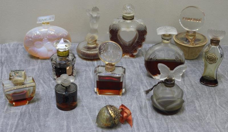 Vintage Perfume Bottle Lot.: Includes Faberge, L'elu, Fleurs de Rocaille de Caron, Rigaud Paris, Faberge Woodhue, Charles at the Riz Ishah, frosted nude stopper, frosted butterfly, frosted Lalique Nina Ricci, opalescent Voeu de N