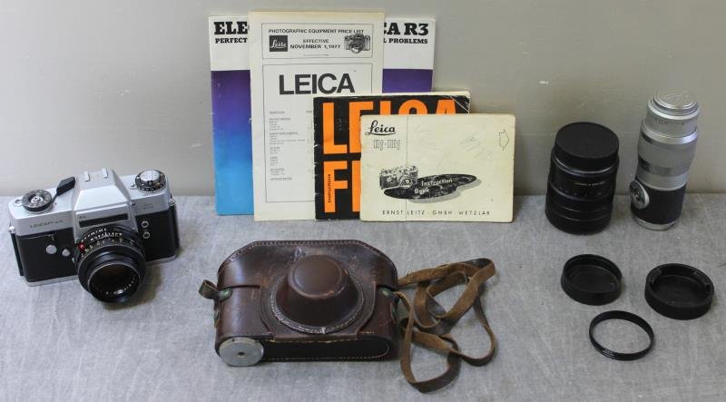 Group of Leica Cameras and Accessories.: Includes a Leicaflex SL - serial no. 1238798, with a Summicron-R 1:2/50 lens; a Leica 2f body - serial no. 764768, with a Summicron f+5cm 1.2 lens; a Leitz Hektor f=13.5cm 1: 4.5 lens; an Elmarit-R 1: