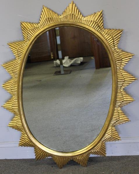 Giltwood Sunburst Style Mirror.: From an Upper East Side, NYC estate. Dimensions: 32"w x 43"h. Condition: Good.