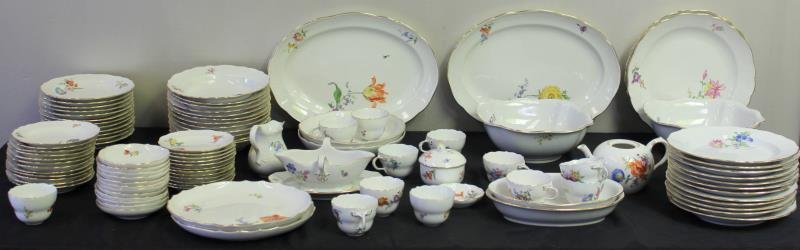 Large Meissen Porcelain Dinner Service for 12.: Includes dinner plates, luncheon plates, soup bowls, bread and butter, cups and saucers, dessert plates, two large open vegetables, two oval platters, two circular trays, two medium circular trays, tw