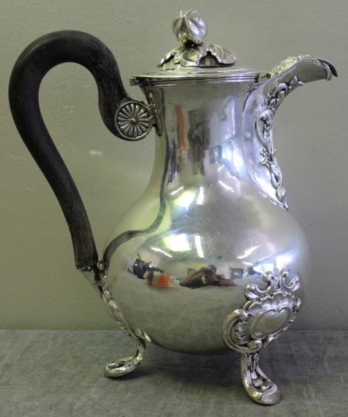 STERLING. 19th C French Footed Teapot.: Beautiful footed teapot with fruit and foliate form finial and wooden handle. Maker's mark of F. Diosne, and additional markings of the head of Minerva in cartouche on top diameter beneath lid. Total