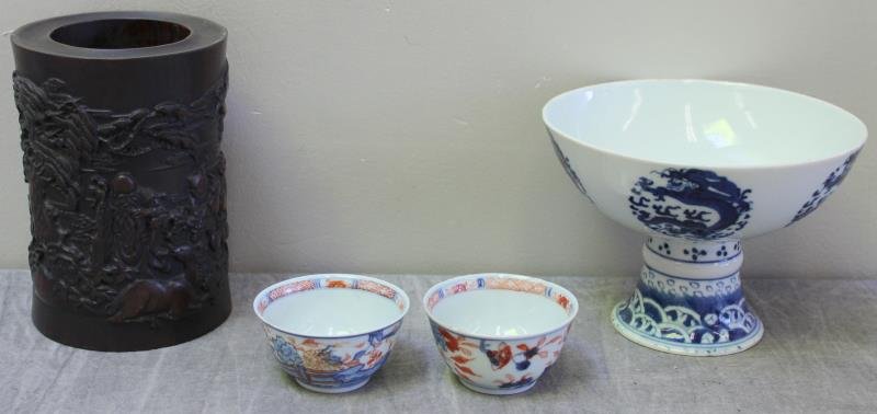 Assorted Vintage/Antique Chinese.: Includes a well carved poem inscribed hardwood brush pot, a blue and white stem base bowl with dragons, and a pair of probably early tea cups. From a Fresh Meadows, NY home. Dimensions: brush pot - 4.