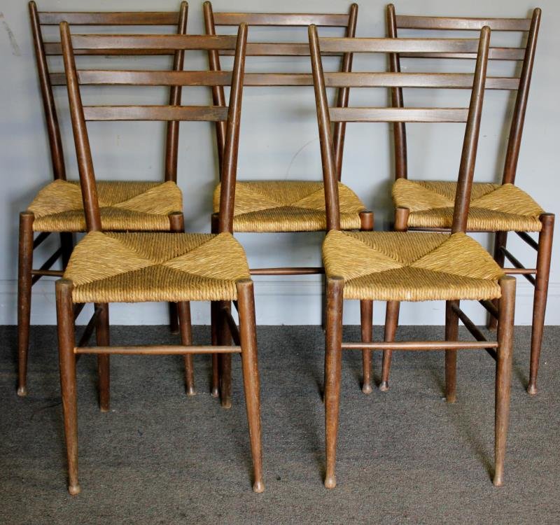 Set of 5 Midcentury Gio Ponti Style Dining Chairs.: Rush seats. Branded "Made in Italy" to each on leg. From a Bronxville, NY estate. Dimensions: 15.5"w x 15"d x 36" high.