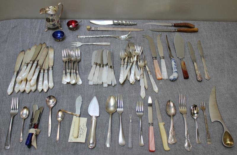 STERLING and SILVER PLATE. Miscellaneous Flatware.: Includes a fish set of 12 forks and knives with mother of pearl handles, 6 Lesco sterling and mother of pearl handled forks, 12 matched knives, a Swid Powell silver plate letter opener, a Gorham sterl