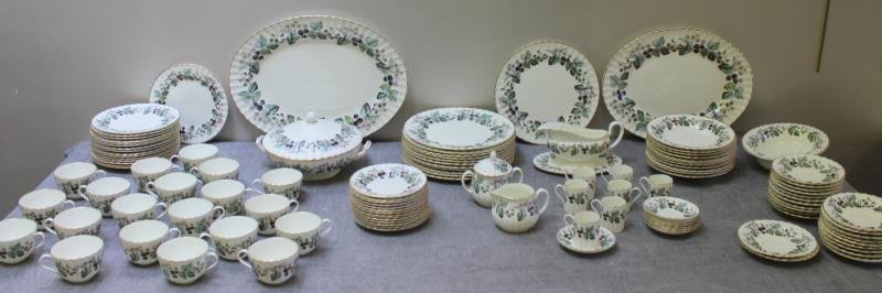 Minton Lavinia Porcelain Dinner Service.: Includes 12 dinner plates, 16 luncheon plates, 11 soup bowls, 20 cups and saucers, 14 bread and butter plates, two oval platters, a covered tureen, 7 demitasse cups and saucers, and sugar and creamer.