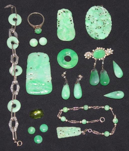 JEWELRY. Miscellaneous Jade Grouping.: Includes 3 carved jade pendants; a jade and pearl brooch; 14kt white gold and jade bracelet; 14kt white gold, jade, and pearl bracelet; 2 beads; 3 button form cabochons; one ring form pendant; two dro