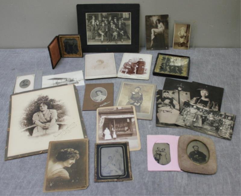 Antique Photo / Ambrotype Lot.: Includes an ambrotype of two Civil War soldiers (?), tintypes (some as is), cabinet cards, an Africal American woman identified as Ephreta Gibson 1899, a biplane postcard, a nudie, etc.