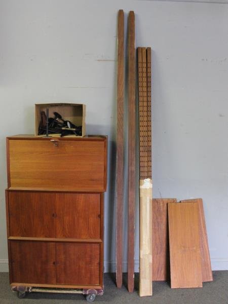 Midcentury Cado / Royal Systems Teak Wall Unit.: Includes 3 hanging cabinets, 3 shelves, and 5 supports. 3 of 5 supports unused and in original signed Paul Cadovius / Cado / Royal Systems box. From a Florence, MA estate. Condition: Good condition wi
