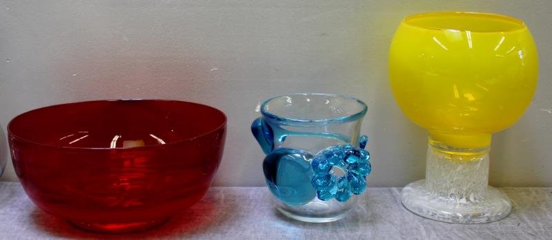 Modern Glass Grouping Including Kaj Franck.: Lot includes a Kaj Franck yellow pedestal bowl, a signed Heikki Orvola red bowl and a beautiful blue applied glass vessel also signed Oryola. From a Bronxville, NY estate. Dimensions: Range from 8" h