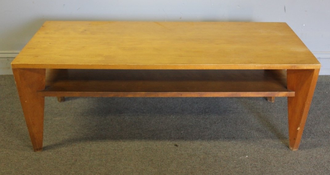 Russel Wright for Conant Ball Coffee Table.: Conant Ball branding to underside. From a Mount Vernon, NY estate. Dimensions: 44" w x 22" d x 15" h.