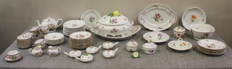 Large Lot of Porcelain Including Herend.: Two Herend covered sugar bowls and two half lemon ornaments, botanical plates, covered dishes, 5 ramekins, an assortment of luncheon and dessert plates, a large tureen and underplate marked Nymphenbur