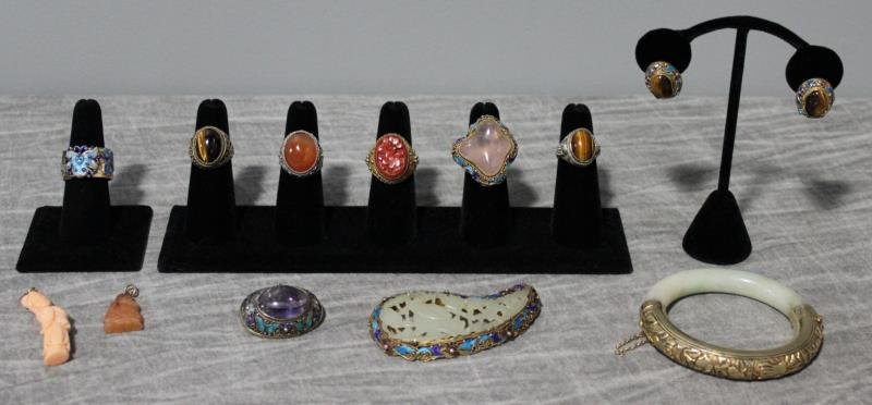 JEWELRY. Asian Jewelry Grouping.: Includes a gilded silver brooch with central pierced jade pendant and blue and purple enamel decoration; a gilded silver ring with blue and purple enamel decoration with central organic form pink quar