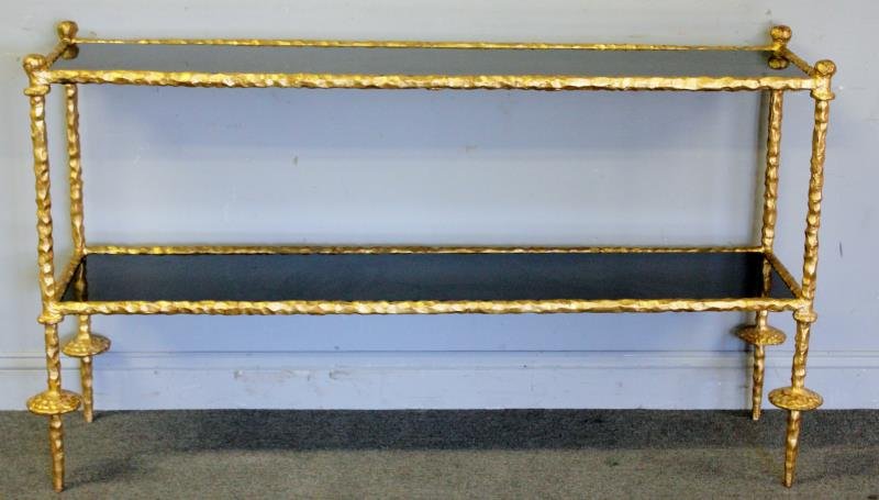 Midcentury Giacometti Style Gilt & Marble Console.: Gilt steel console with black marble two tier inserts in the style of Alberto Giacometti. Good quality and heavy. This console is back from previous auction due to nonpayment by bidder Robert Harris o