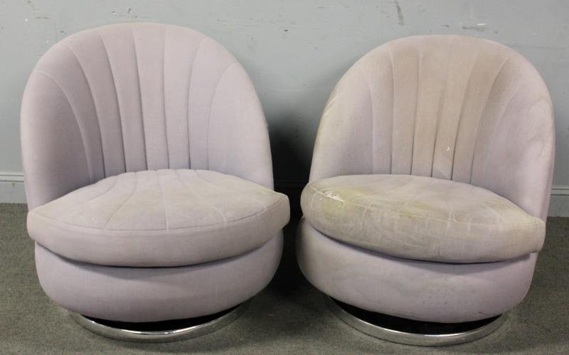 Pair Milo Baughman for Thayer Coggin Swivel Chairs: Shellback upholstered swivel chairs. Thayer Coggin label. Dimensions: 30" w x 35" d x 31" h. Condition: Upholstery as is with fading, tears at seams and some staining.