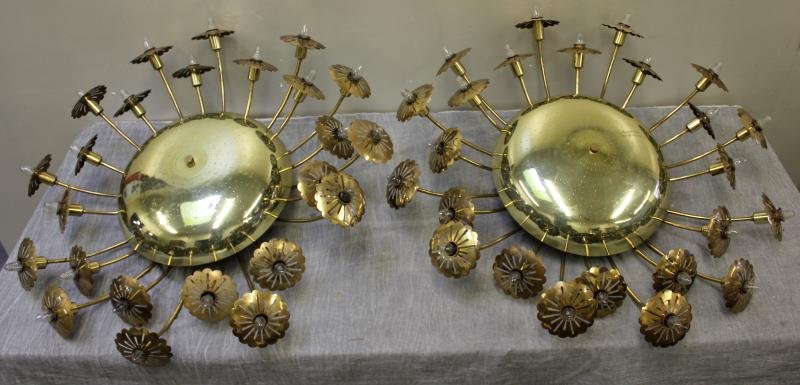 Pair of Brass Paavo Tynell (Attr.) Chandeliers.: Attributed to Paavo Tynell as commissioned work. Flush mounted pierced brass dome and 24 arm chandeliers with flower bobeches. Originally from the Supper Club in Minneapolis, then a Greenwich, CT esta