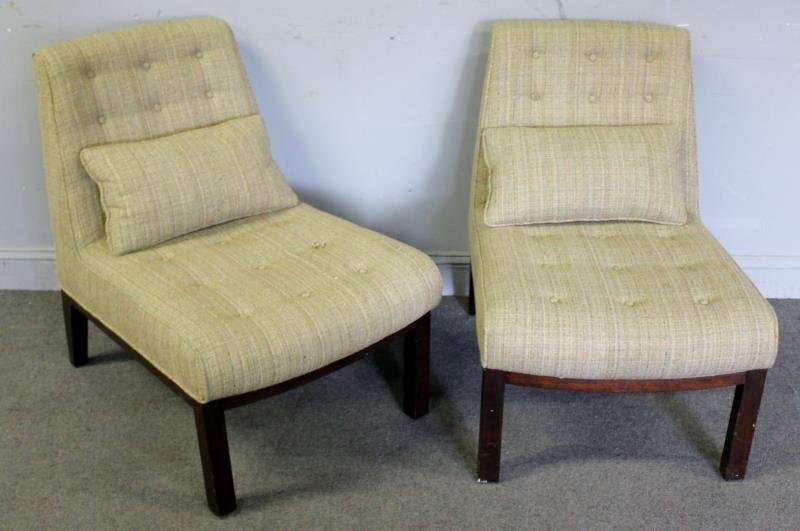 Midcentury Pair of Dunbar Slipper Chairs.: Beige upholstered. Unmarked but not original upholstery. From a Manhattan, NY estate. Dimensions: 23" w x 29" d x 32.5" h. Condition: Good. One missing button.