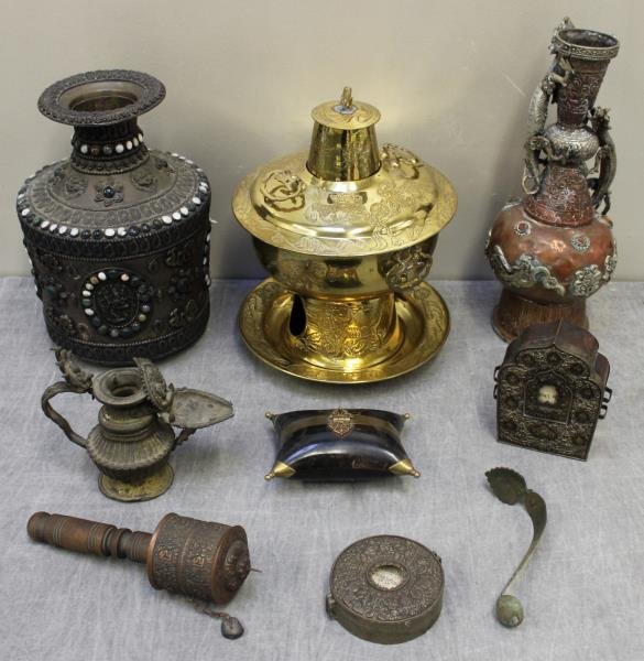 Assorted Vintage Chinese/Tibetan Metal Items.: Includes a brass coal warmer, vases, prayer holders, etc., and a brass mounted pillow form horn box. From a New Canaan, CT estate. Dimensions: coat warmer - 14.5" h; prayer holder - 6.5" h; prayer hol