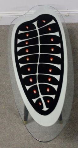 Midcentury Mirrored Miro Style Coffee Table.: Black base and glass top with central mirrored and designed section. From a Pelham, NY estate. Dimensions: 47.5" w x 16.5" d x 13" h.