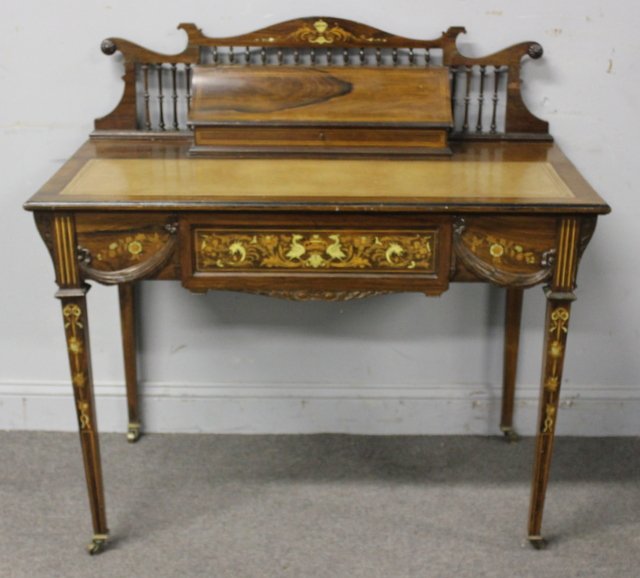 Romney & Co. Edwardian Signed & Inlaid Leather Top: Rosewood Desk. Fine quality inlays and the drawer stamped Romney & Co. Liverpool. From a Harrison NY estate. Dimensions: 38.25" h x 39" w x 20.25" d.