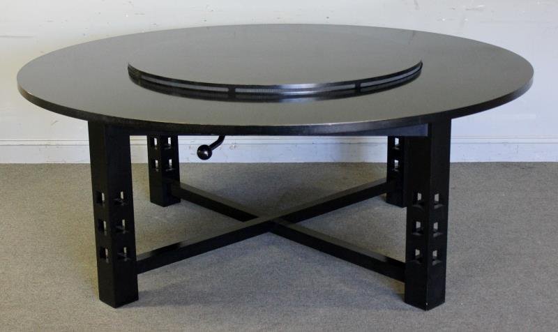 Charles Rennie Mackintosh for Cassina DS3 Table.: Manufactured by Cassina. Black painted oak table by Charles Rennie Mackintosh. With original assemblage booklet. Central rising rotating platform (1.5" h) mechanized by underside handle. From a Piermo