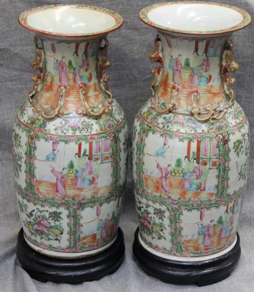 Pair of Antique Rose Famille Vases on Wood Stands.: Gilded foo dogs and lizards. From a Weston, CT estate. Dim: 8.5" diameter x 17" h.