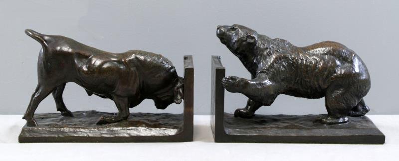 HARVEY, Eli. Pair of Bronze Bull & Bear Bookends.: Both with incised signature and date on base: ' (c) 1926 by Eli Harvey Sc.'. Eli Harvey (American, 1860 - 1957). From a Fairfield, CT home. Dimensions: Each 7.75" high x 11.25" wide x 4.75" deep. Cond