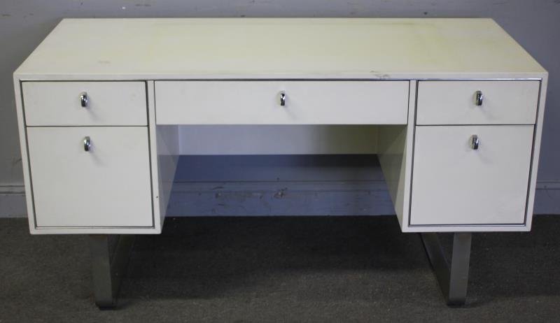 Midcentury Milo Baughman? Desk.: Marked West Michigan Furniture Company. Attributed to Milo Baughman. From a Larchmont, NY estate. Dimensions: 54" w x 24" d x 29.5" h. Condition: Good with some discoloration to top, chrome needs poli