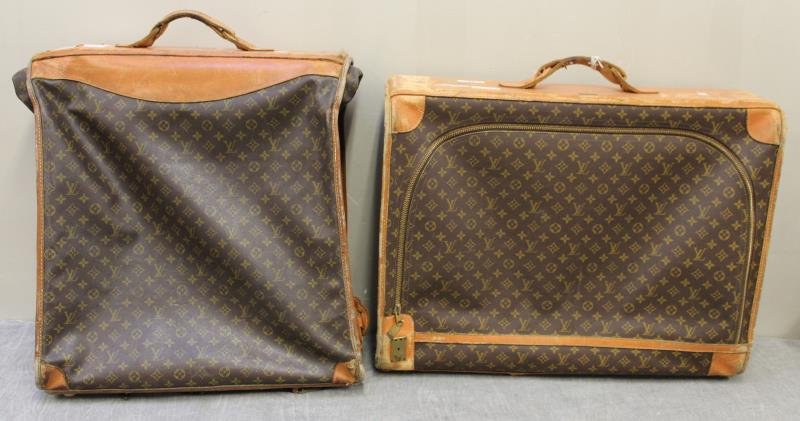Vintage Louis Vuitton Luggage Grouping.: Includes one suitcase, and one suitcase/garment bag. From a Harrison, NY estate. Dimensions: suitcase - 28.25" w x 9.375" d x 22" h, excluding handle.