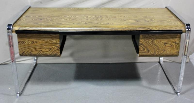 Midcentury George Nelson for Herman Miller Desk.: Chrome side and exotic wood. Labeled Herman Miller. From a Mamaroneck, NY estate. Condition: Good. Dimensions: 65" w x 32" d x 30" h.