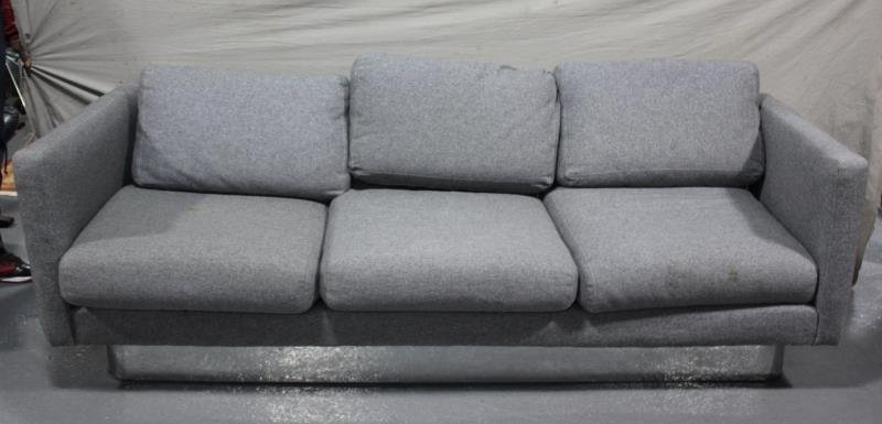 Midcentury Milo Baughman Style Chrome Base Sofa.: Unmarked. Indicative of Milo Baughman. From a Mamaroneck, NY estate. Dimensions: 74" w x 28" d x 33" h. Condition: Good, needs cleaning. Some areas of chrome with lifting off support and minor crinkli