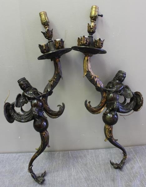 Pair of Figural Gilt and Patinated Bronze Sconces.: A beautiful and decorative pair of mermaid form sconces. From a Southampton, Long Island, NY home. Dimensions: 28" long. Condition: good.