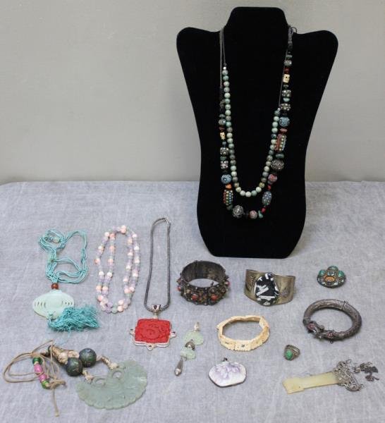 JEWELRY. Miscellaneous Asian Jewelry Grouping.: Includes a Jay King sterling cuff with inlaid hardstone pendant and pierced Asian characters; gilded silver brooch with floral enamel decoration and inlaid green cabochons -one missing; floral porcela