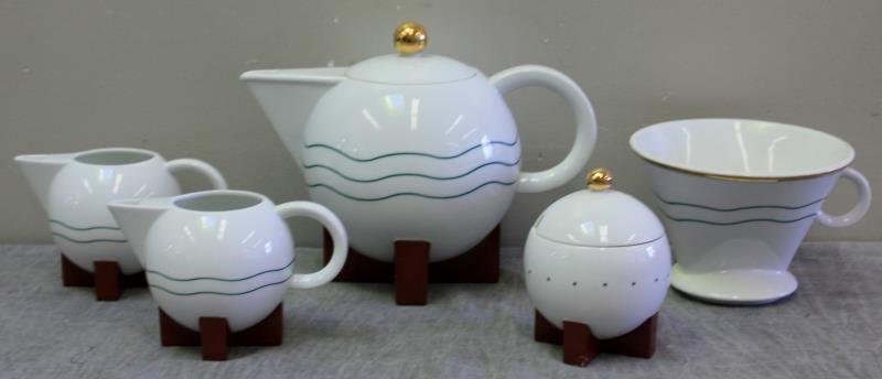 Michael Graves for Swid Powell Tea Set.: Includes tea pot, colander, sugar, creamer, and milk pitcher. Marked Michael Graves / Swid Powell to underside. From a Larchmont, NY home