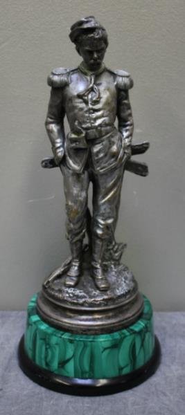 Sighed French Bronze of a Soldier.: Silver plated bronze. Signed probably C. Anfrie for Charles Anfrie. Further inscribed d'apres and the rest is illegible or under the soldier's gun stock. On a malachite and marble base. From a Norwalk