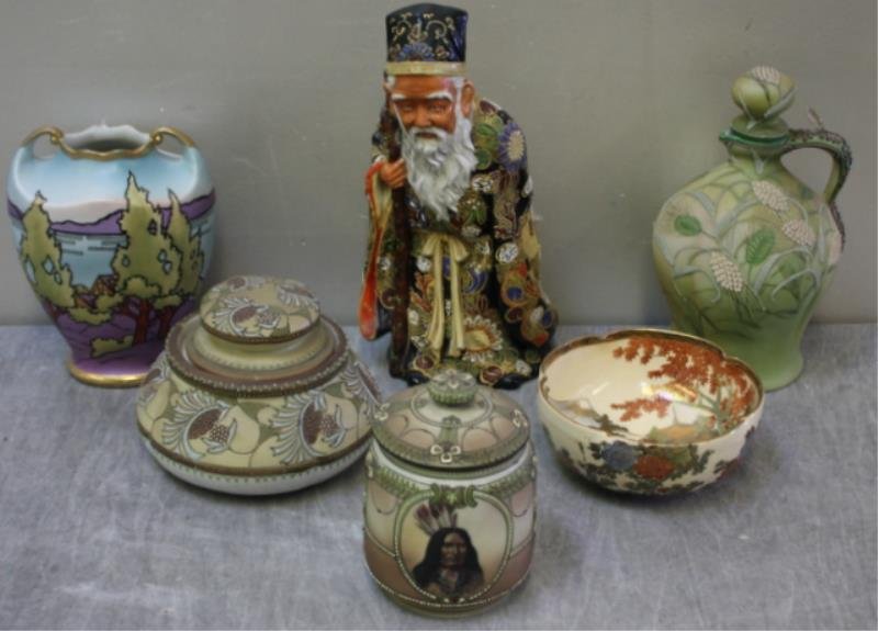 Nippon / Japanese Lot.: Includes a blown out pitcher, a blown out dresser box, a covered jar decorated with a portrait of a Native American, an Arts and Crafts vase, a Satsuma figure and Satsuma bowl. From a Bronxville, NY e