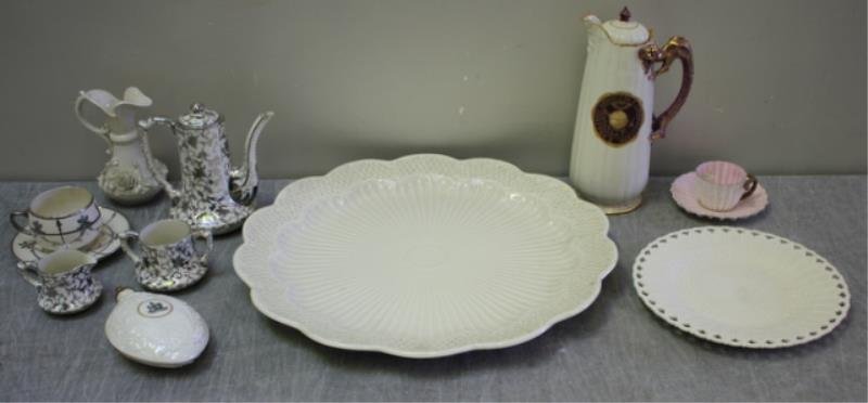 Miscellaneous China Lot.: Includes American Belleek and sterling teaset, Willets overlaid cup and saucer, Ott and Brewer cup and saucer, unusual "Belleek" Star of David flask, a great Willets Belleek Williams College pitcher, 