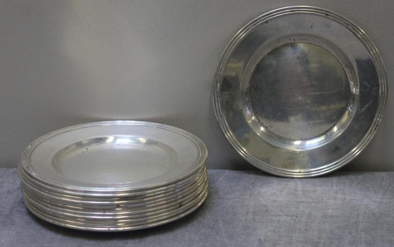 STERLING. 12 Sterling Silver Bread Plates.: Total approx. weight is 61.99 troy oz. From a Scarsdale, NY estate. Dimensions: 6.125" diameter. Condition: Light surface scratches, and some spots of oxidation.