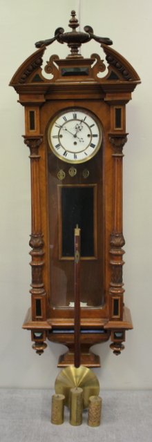 19thCentury 3 Weight Wall Regulator Clock.: Dial signed Zagreb. Engraved weights and a nice case. From a Port Chester, NY estate. Dimensions: 16.5" w x 53" h x 7.25" d. Condition: Hairline to dial, small chip or wood loss neat bottom. All clock