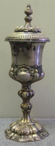 SILVER. Antique German Covered Pedestal Cup.: Weighted. Apparently unmarked. From a Hastings-on-Hudson, NY estate. Dimensions: 4.25" diameter of base x 11.875" h to top of finial on lid.