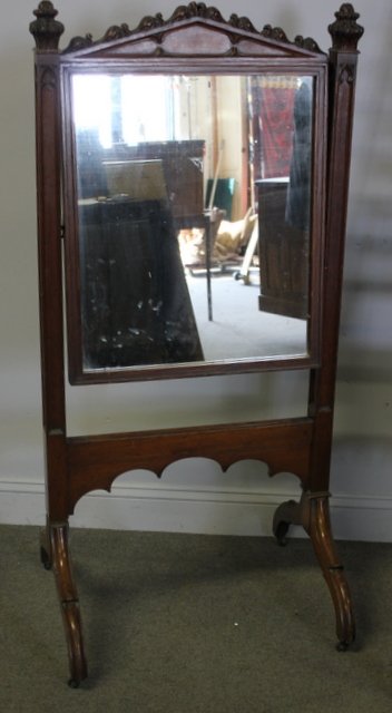 Carved Gothic Style Mirror on Stand.: From a Long Island, NY estate. Dimensions: 26" w x 20" d x 53.5" h.
