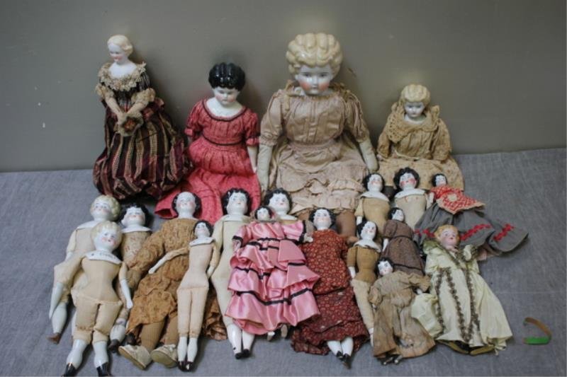 Large Group of Vintage Porcelain Head Dolls with: Cloth Bodies. To be sold as is - some chipped boots, some missing legs, at least 2 cracked necks. From a Hastings-on-Hudson estate. Dimensions: Up to 17.5" tall.