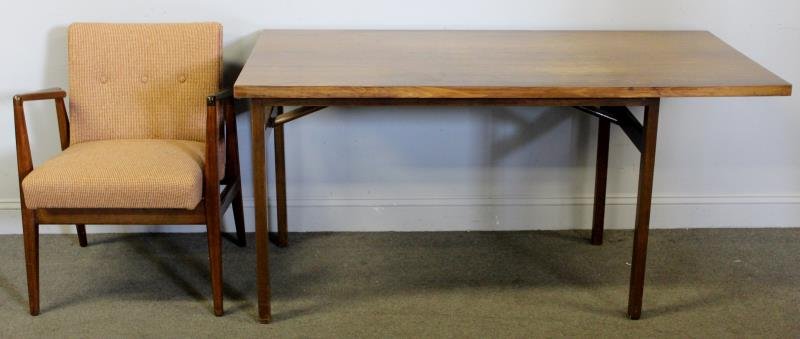 Midcentury Jens Risom Desk and Chair.: Includes a labeled Risom writing desk with top mounted asymetrically to base. Together with a Jens Risom labeled upholstered angular arm chair. From a Stamford, CT home. Dimensions: Desk - 60" w x 30"