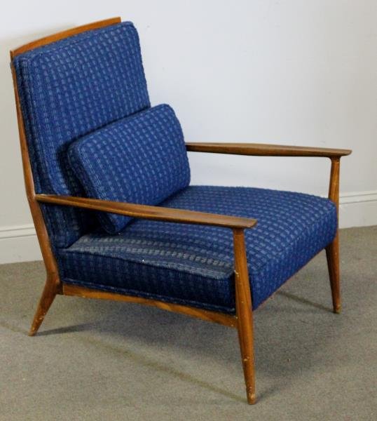 Paul McCobb for Directional Lounge Chair.: Midcentury. Unmarked. With later upholstered lumbar pillow. From a Stamford, CT estate. Dimensions: 27.5" w x 31" d x 35" h. Condition: Good with some scuffs to legs from use.