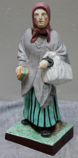 Russian Porcelain Figure of a Woman. (1 of 6)
