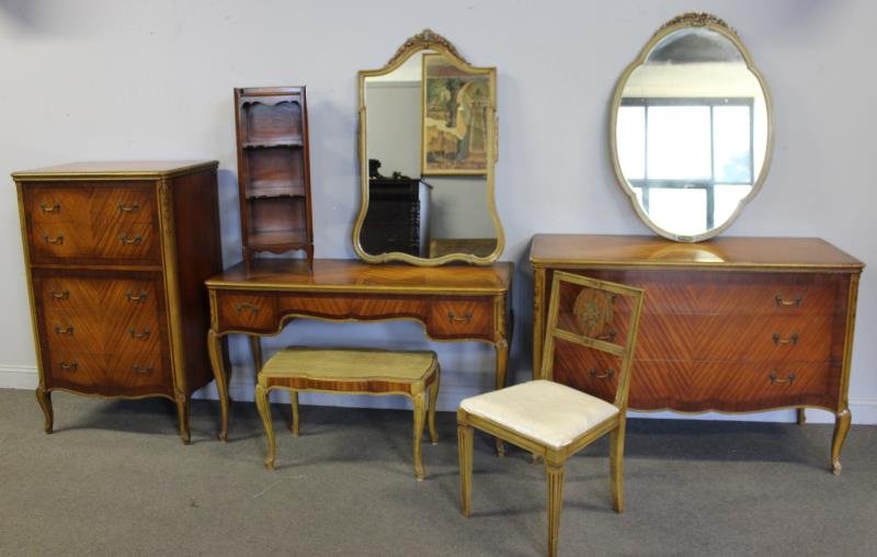 Vintage 8 Piece Satinwood Banded Bedroom Set.: Includes a high chest, a vanity and mirror, a gentleman's chest and mirror, a single mirror, a 3 tier stand, a single chair, and a bench. From a Briarcliff, NY home. Dimensions: Dresser - 51" w x 22" 