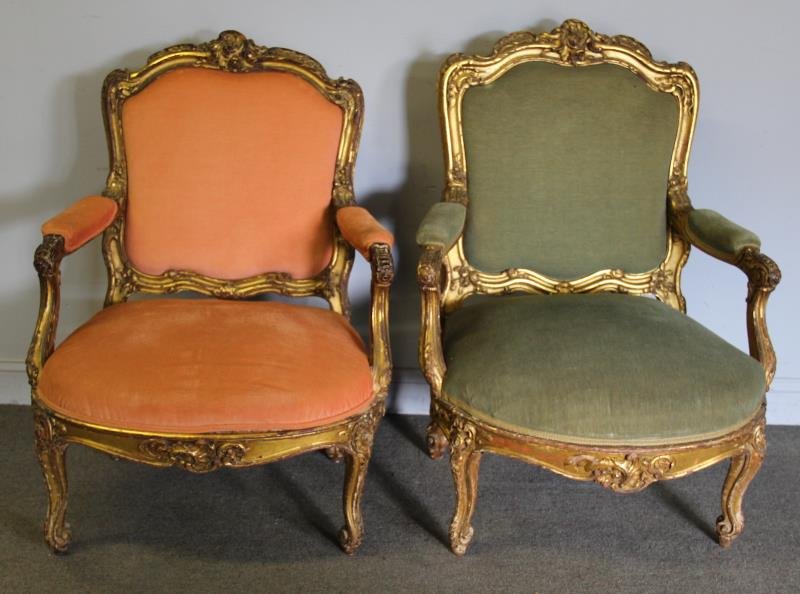 His and Hers 19th C Louis XV Style Armchairs.: Giltwood upholstered chairs. From a Westchester, NY estate. Dimensions: his - 31" w x 25" d x 43" h; hers - 29" w x 25" d x 40" h. Condition: Wear to gilding with scuffs and scratches.