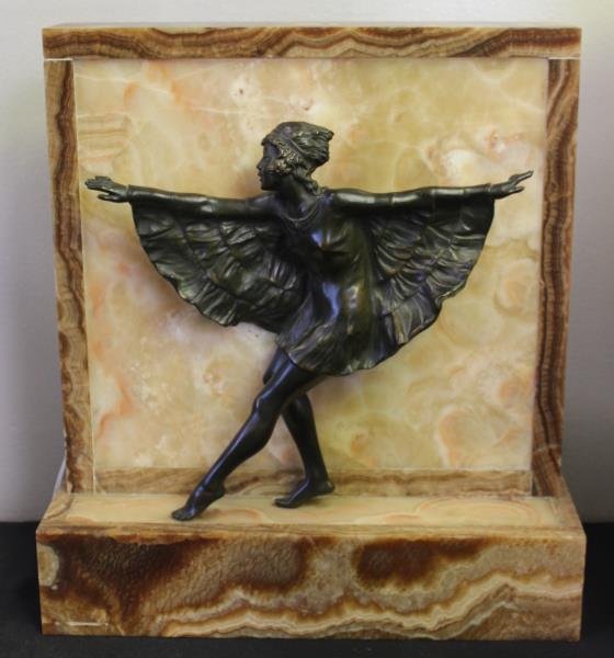 Art Deco Patinated Bronze & Onyx Figural Lamp.: Attributed to Marcel Bouraine. From a Stamford, CT estate. Condition: Good. Overall dimensions: 14.25" w x 5.25" d x 15.75" h; bronze only - 11" w x 2.5" d x 10.5" h.