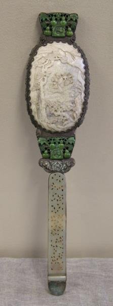 Asian Silver and Jade Hand Mirror.: Consists of a carved jade handle, green dyed ivory fruit and flower decoration, and central carved white/grey carved ivory plaque. Silver decorated with bats and flowers. From a Long Island, NY estate